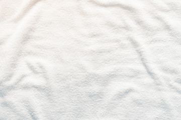 White towel texture background with abstract pattern. That fabric or textile consist of cotton fiber or natural material. For absorb water, drying and wiping in bathroom, laundry and kitchen room.