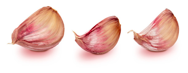 Set of red garlic cloves. Isolated on white background