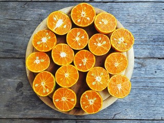 Fresh chopped orange slices food background, Orange cut pieces juicy delicious and healthy fruit fruit drink. Orange ,Thai Fruit,Sour , Sweet and sour taste , delicious , Vitamin C
