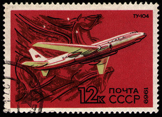 USSR - CIRCA 1969: post stamp 12 Soviet kopek printed by USSR, shows Tupolev Tu-104 (NATO reporting name: Camel), twinjet medium-range narrow-body turbojet-powered Soviet airliner, circa 1969