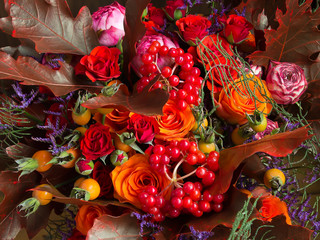 A beautiful bouquet of colorful red, yellow, orange and purple flowers / Bouquet at autumn tones