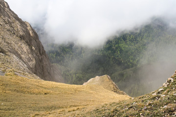Mountains in the clouds. and dangerous slope