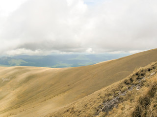 Mountains in the clouds. View from the top.