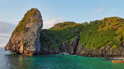 Amazing sunset aerial view of Nui Beach from drone. Ko Phi Phi Don, Thailand