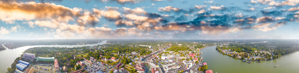Panoramic aerial view of Amphawa Market at sunset, famous floating market near Bangkok, Thailand