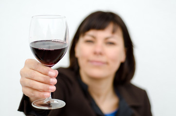 Woman Holding Up a Glass of Red Wine.