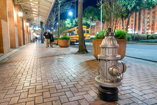 Fire hydrant along city streets at night