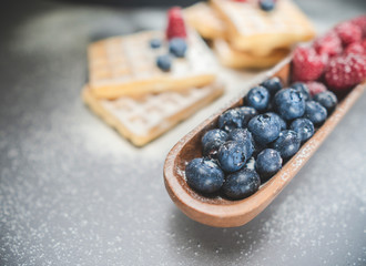 Delicious cake with raspberries and blueberries