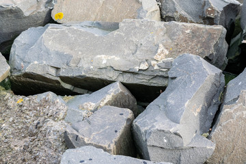 A collection of large rocks piled up on each other situated at the edge of Roker Beach in Sunderland, Tyne and Wear.