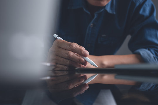 Working on digital tablet and laptop computer