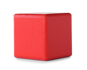 Red wooden toy cube isolated on white