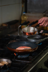 Fresh salmon in a frying pan