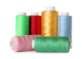 Set of color sewing threads isolated on white