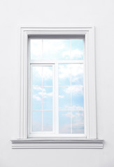 Fototapeta na wymiar White wall of modern building with window