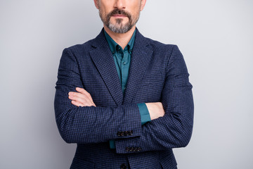 Cropped photo of attractive mature man hiding facial expression no smile perfect neat bristle arms...