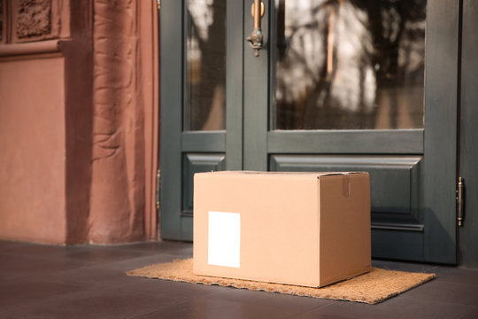 Boxes On Doorstep Of House High-Res Stock Photo - Getty Images