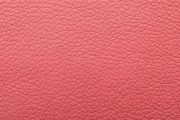 Texture of pink leather as background, closeup
