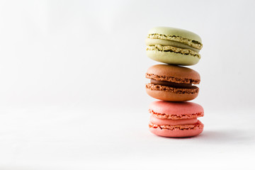 delicious multi flavor  Macarons on white background with space for text