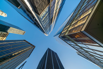 Looking up at business buildings in downtown New York City