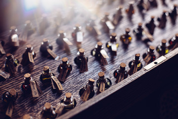 Obraz premium Alchemical aroma oils, perfume fragrances with wooden box