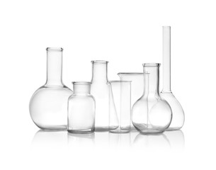 Clean empty laboratory glassware isolated on white