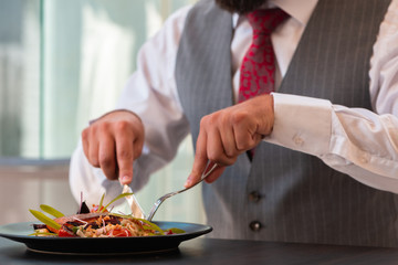 Businessman eating a delicious meal