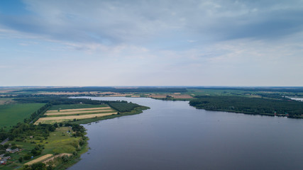 Aerial view. Beautiful landscape lake in the green forest. Forest lake summer landscape. Beauty concept background.