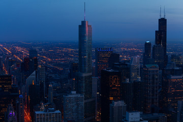 Chicago downtown evening last sunlight time cityscape wide panorama, aerial or bird-eyes view Illinois, USA.