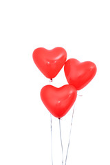 Fototapeta na wymiar Red heart shaped helium balloon isolated on white background with ropes, Valentine's day, Mother's day, birthday party design concept. Clipping path.