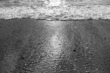 Black and white photography of beautiful sunny sunset sea beach