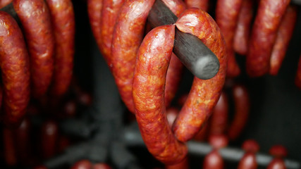 Sausage red smokehouse smoked on beech wood pig slaughter traditional Czech household hangs, sausage-meat, smoked meat, ribs, blood sausage, traditional farm farming homemade - obrazy, fototapety, plakaty