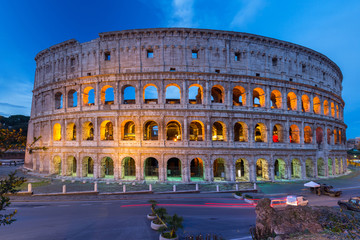 Fototapeta na wymiar The Colosseum illuminated at night in Rome, Italy