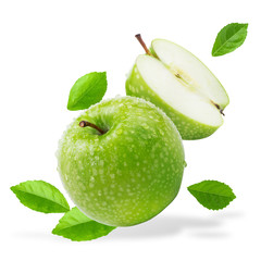 Water splashing on Fresh green apple on Green background