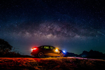 Fototapeta na wymiar Reliant Cars with the Milky Way