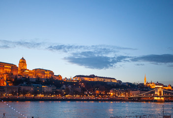 Obraz premium Budapest Castle at sunset from danube river
