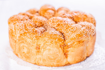 Traditional Serbian pogaca or cesnica bread covered with sesame seeds.