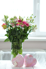 Spring card template. Happy Birthday or Valentine. Women's Day. Greeting card for mother's day. Congratulation with flowers. Copy space. Wedding invitation. Roses and Eustomas on window background