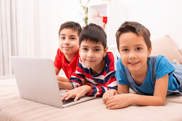 Children of different ages use gadgets for games, communication and for learning.  Modern lifestyle.