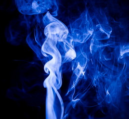 Obraz premium Blue smoke on black background