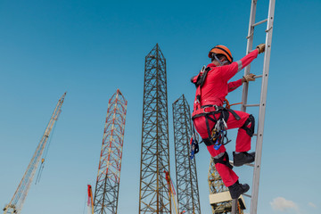 Technician Wear seat belts Safety harness Going up the stairs fixed ladder Working on a high ground...