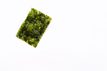traditional japanese dried nori seaweed isolated on white © Olga