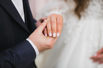 Wedding couple bide and groom get married in a church