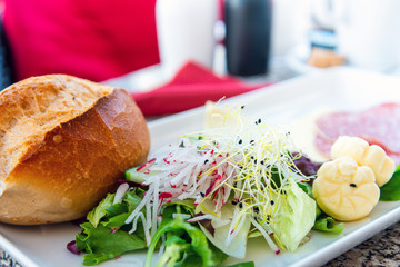 Fresh fruits salad and ham breakfast