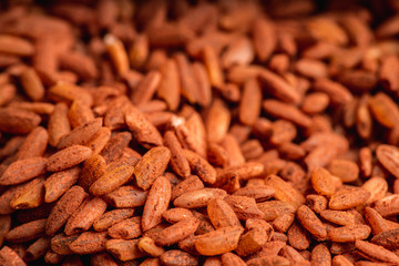 Raw red rice Dev-zira on the kitchen table. Selective focus. shallow depth of field.