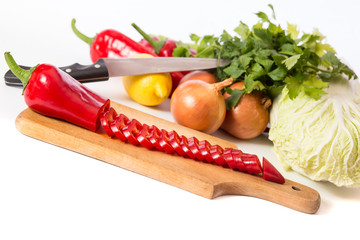 sliced red pepper and other vegetables for salad