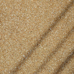 brown stone wall with line of shadow