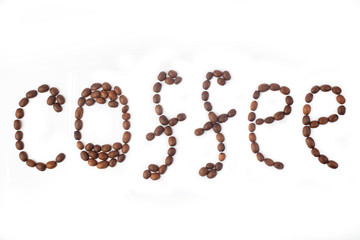 word made of coffee beans isolated on white