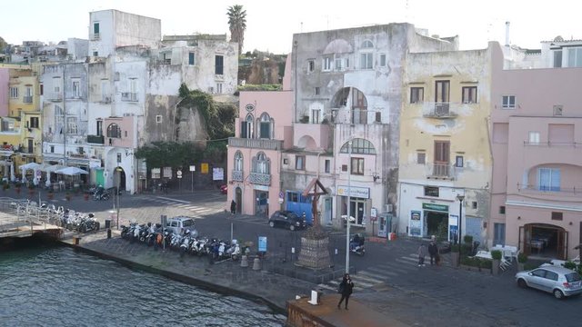 Campi Flegrei, Naples, Campania, Italy -  Decemeber 5 2019: the pastel colors of Marina Corricella in the port of Procida