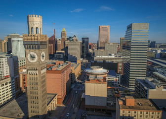 Aerial View of Downtown Baltimore Maryland on a Sunny Fall Afternoon - with the Seltzer Arts Clock Tower and Various Buildings and Skyscrapers in the Frame