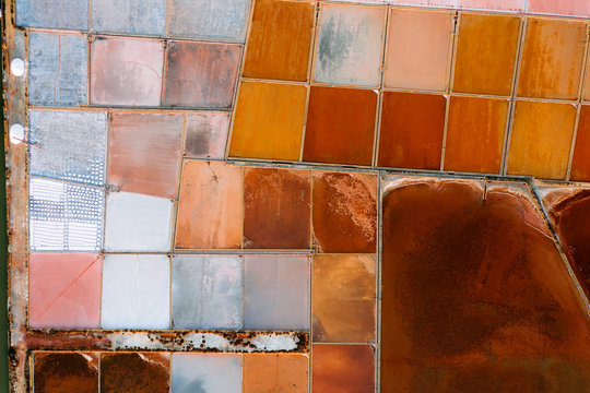 Aerial image of colorful salt mines in Sicily, Italy.